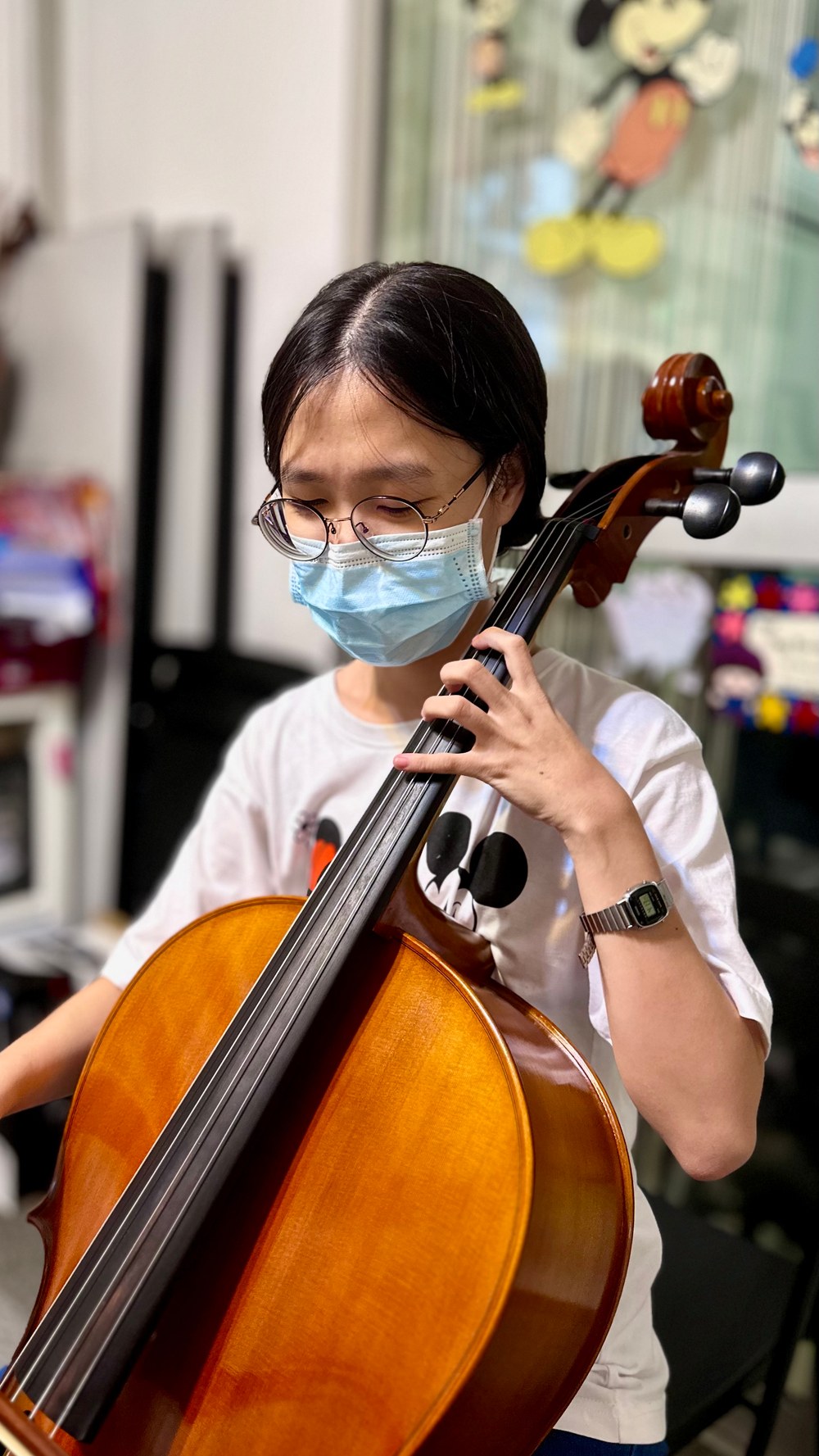 A cello student practising